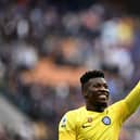 Inter Milan's Cameroonian goalkeeper Andre Onana celebrates after winning the Italian Serie A football match (Photo by GABRIEL BOUYS/AFP via Getty Images)