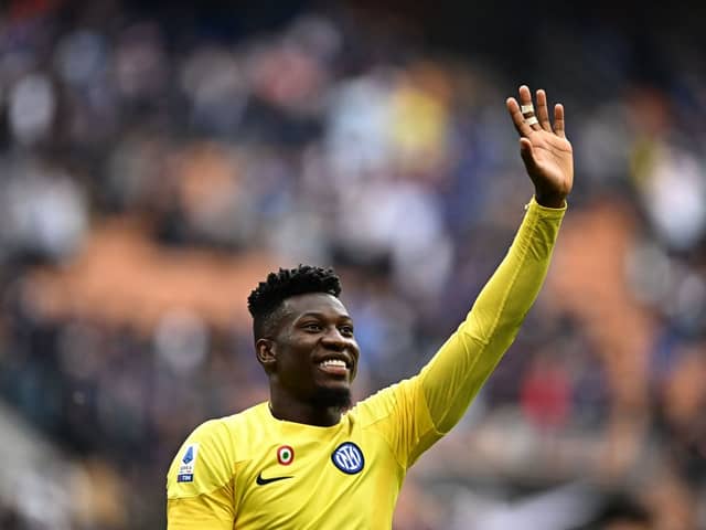 Inter Milan's Cameroonian goalkeeper Andre Onana celebrates after winning the Italian Serie A football match (Photo by GABRIEL BOUYS/AFP via Getty Images)