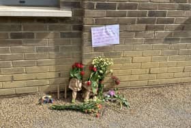 Flowers at the scene on Commercial Road, Limehouse, east London two dogs were shot by police on Sunday. (Photo by SWNS)