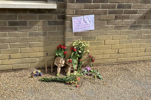 Flowers at the scene on Commercial Road, Limehouse, east London two dogs were shot by police on Sunday. (Photo by SWNS)