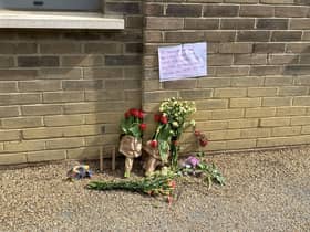 Flowers at the scene on Commercial Road, Limehouse, east London two dogs were shot by police on Sunday. (Photo by SWNS)
