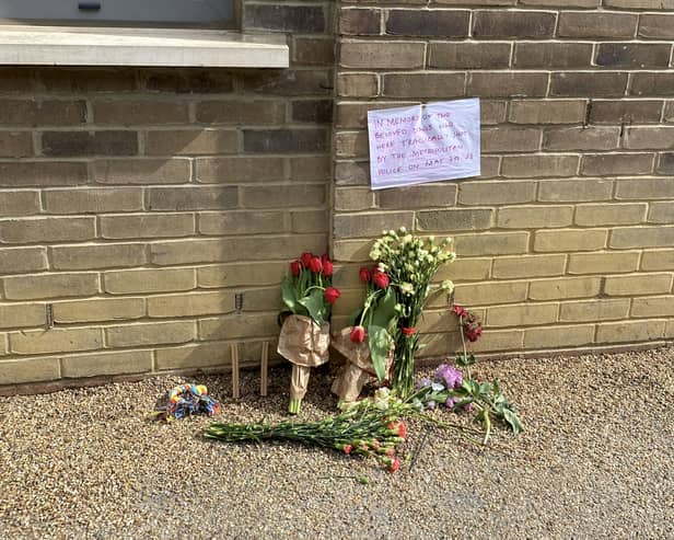 Flowers at the scene on Commercial Road, Limehouse, east London two dogs were shot by police on Sunday. (Photo by SWNS)