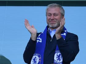 Chelsea’s Russian owner Roman Abramovich applauds, as players celebrate their league title win  (Photo by BEN STANSALL/AFP via Getty Images)