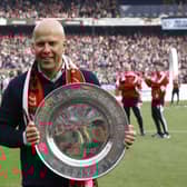 Feyenoord coach Arne Slot celebrates with the championship trophy after winning the Dutch Eredivisie (Photo by MAURICE VAN STEEN/ANP/AFP via Getty Images)