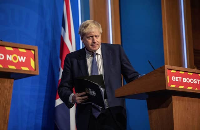 Boris Johnson to stick with ‘Plan B’ Covid measures despite mounting pressures (Photo by JACK HILL/POOL/AFP via Getty Images)