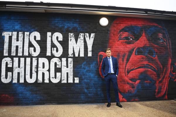 Steve Parish, Chairman of Crystal Palace stands alongside a mural commemorating musician Maxi Jazz is unveiled outside the stadium  (Photo by Alex Davidson/Getty Images)
