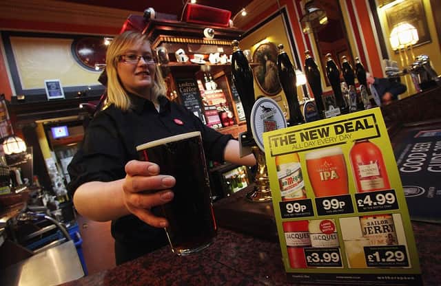 Wetherspoons 99p pints: pub chain will slash drink prices in November - with some beers costing under £1 (Photo by Matt Cardy/Getty Images)
