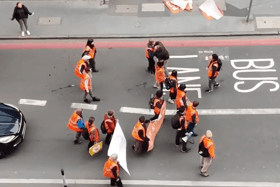 Just Stop Oil protests got violent this morning as an aggressive passer by shoved a female protester to the ground