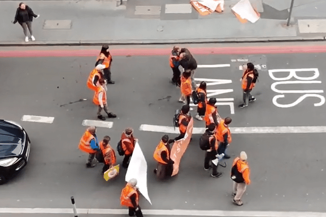 Just Stop Oil protests got violent this morning as an aggressive passer by shoved a female protester to the ground