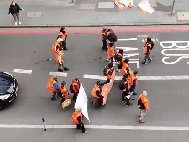 Just Stop Oil protests got violent this morning as an aggressive passer by shoved a female protester to the ground