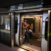 A train stops at the Canary Wharf Elizabeth Line station in east London. Credit: Daniel Leal/AFP via Getty Images.