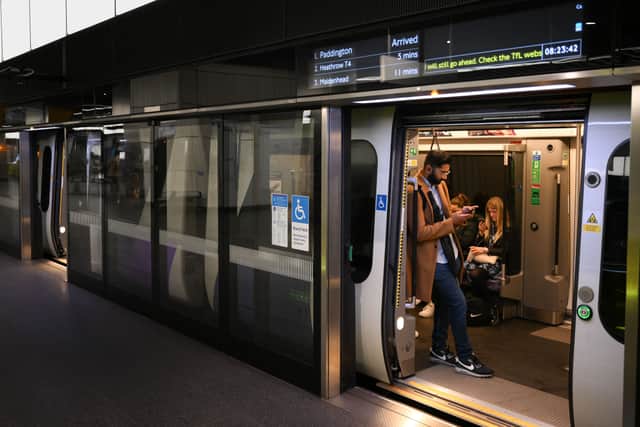 A train stops at the Canary Wharf Elizabeth Line station in east London. Credit: Daniel Leal/AFP via Getty Images.