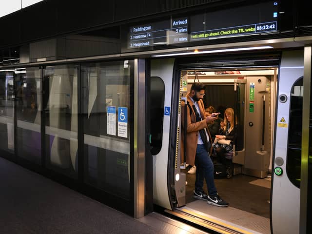 A train stops at the Canary Wharf Elizabeth Line station in east London. Credit: Daniel Leal/AFP via Getty Images.