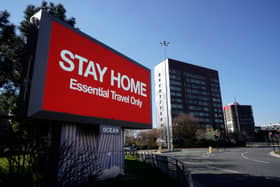 A giant television over the A57 Motorway urges people to stay home on March 26, 2020 in Manchester, England. (Getty Images)