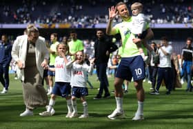  Harry Kane of Tottenham Hotspur acknowledges the fans with his family after the final whistle (Photo by Julian Finney/Getty Images)