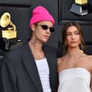 Justin and Hailey Bieber arrive for the 64th Annual Grammy Awards in Las Vegas in April. (Photo by ANGELA  WEISS/AFP via Getty Images)