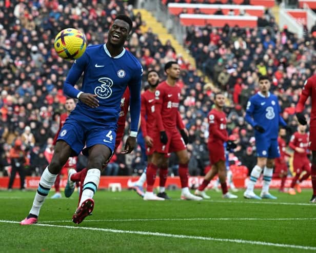 Chelsea's French defender Benoit Badiashile eyes the ball during the English Premier League football match (Photo by PAUL ELLIS/AFP via Getty Images)