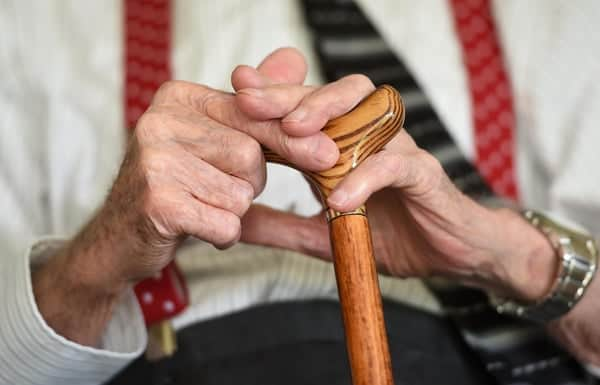 Share and Care pairs up younger people with those who are vulnerable, older or disabled, to provide companionship and help them around their home. Credit: Joe Giddens/PA.