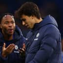 Raheem Sterling of Chelsea appeals to Joao Felix during a private conversation (Photo by Clive Rose/Getty Images)