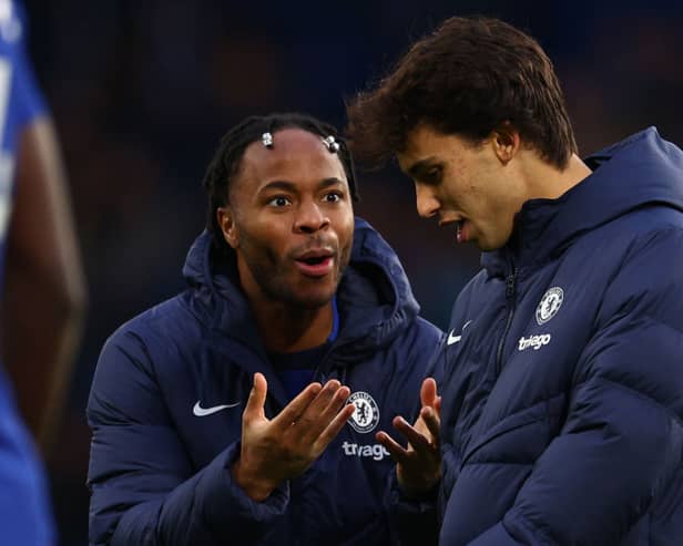 Raheem Sterling of Chelsea appeals to Joao Felix during a private conversation (Photo by Clive Rose/Getty Images)