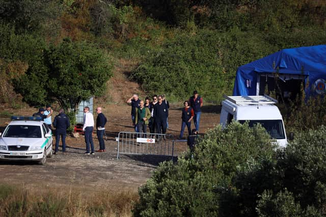 Portuguese Judicial Police criminal investigation unit members prepare at the base camp near the Arade dam, in Silves, on 24 May, 2023 on the second day of a new search operation amid the investigation into the disappearance of Madeleine McCann. (Photo by FILIPE AMORIM / AFP) (Photo by FILIPE AMORIM/AFP via Getty Images)