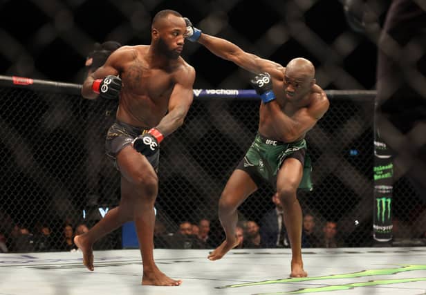 Kamaru Usman strikes Leon Edwards during the UFC Welterweight Title Bout between Leon Edwards and Kamaru Usman at The O2 Arena in March 2023. (Photo by Catherine Ivill/Getty Images)