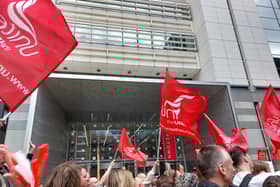 St Mungo’s staff striking outside their Tower Hill offices. Credit: Ben Lynch.