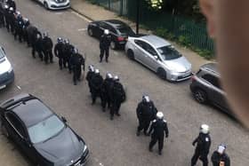 Riot police outside the Shadwell homeless shelter. Credit: Autonomous Winter Shelter.