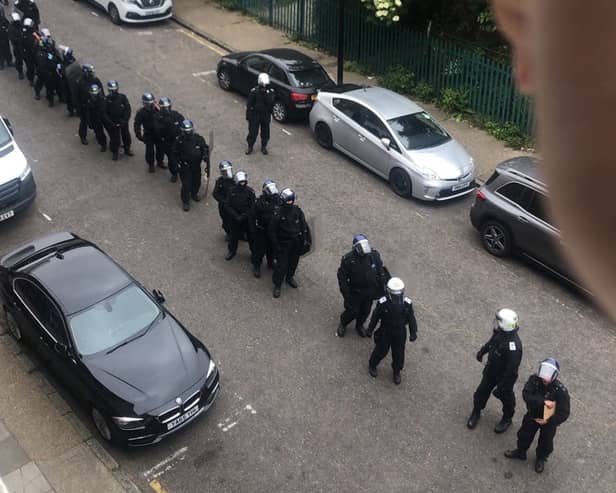 Riot police outside the Shadwell homeless shelter. Credit: Autonomous Winter Shelter.