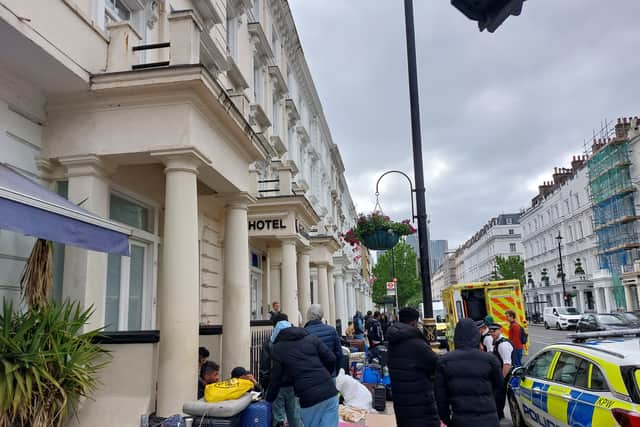 The asylum seekers outside the hotel on the morning of June 2. Credit: Ben Lynch.