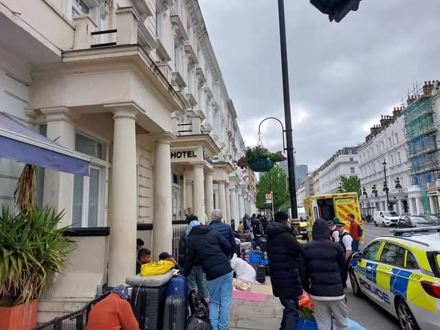The asylum seekers outside the hotel on the morning of June 2. Credit: Ben Lynch.