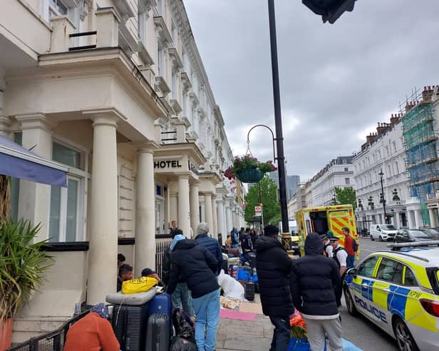 The asylum seekers outside the hotel on the morning of June 2. Credit: Ben Lynch.