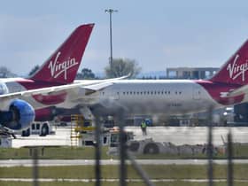 Virgin Atlantic passenger aircraft at Heathrow Airport. (Photo by BEN STANSALL/AFP via Getty Images)