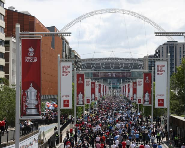 A fan was arrested at Wembley yesterday for wearing an offensive Hillsborough shirt