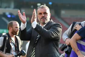 Angelos Postecoglou, Manager of Celtic, applauds the fans after the final whistle of the Scottish Cup (Photo by Mark Runnacles/Getty Images)