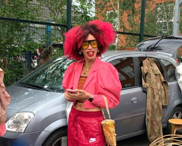A happy customer at St. Augustine’s car boot sale in Kilburn