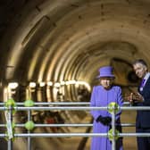 The late Queen Elizabeth II with then TFL commisioner Mike Brown at the entrance to one of the new Crossrail tunnels at Bond Street in 2016. (Photo credit should read RICHARD POHLE/AFP via Getty Images)