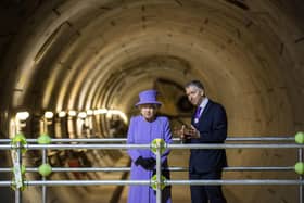 The late Queen Elizabeth II with then TFL commisioner Mike Brown at the entrance to one of the new Crossrail tunnels at Bond Street in 2016. (Photo credit should read RICHARD POHLE/AFP via Getty Images)