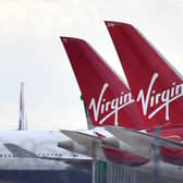 Virgin Atlantic passenger aircraft at Heathrow Airport. (Photo by BEN STANSALL/AFP via Getty Images)