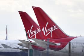 Virgin Atlantic passenger aircraft at Heathrow Airport. (Photo by BEN STANSALL/AFP via Getty Images)