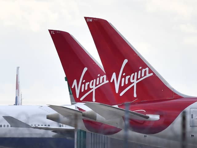 Virgin Atlantic passenger aircraft at Heathrow Airport. (Photo by BEN STANSALL/AFP via Getty Images)