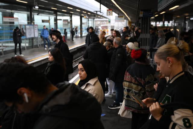 Commuters waiting for a Central line train at Stratford station. Credit: Daniel Leal/AFP via Getty Images.
