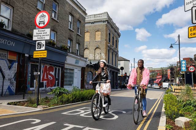 Cyclists riding through an LTN in London. Credit: TfL.