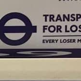 The logo of an illegal flyposting on a London Underground train. Credit: Amber Allott.