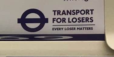 The logo of an illegal flyposting on a London Underground train. Credit: Amber Allott.