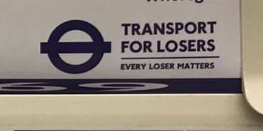 The logo of an illegal flyposting on a London Underground train. Credit: Amber Allott.