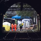 Emergency workers at the scene of the Croydon tram crash. (Photo by Carl Court/Getty Images)
