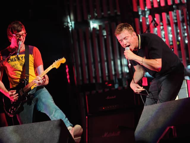 Graham Coxon and Damon Albarn of Blur perform on the Pyramid Stage at the Glastonbury Festival in 2009. (Photo by Jim Dyson/Getty Images)