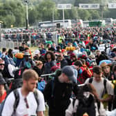 People head in to Glastonbury Festival after Emily Eavis officially opened the festival. 