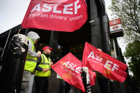 Aslef rail workers stand on a picket line outside Euston in May. (Photo by Leon Neal/Getty Images)